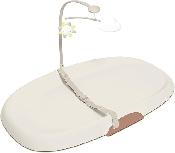 Skip Hop Oat Contoured Wipe-Clean Changing Pad with Tuck-Away Toy Bar