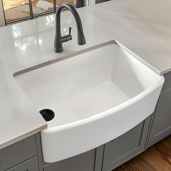 Sinkology Austen 33 in White Fireclay Bow-Front Farmhouse Sink, Apron | Curved bow-front apron, undermount install, SureFire glaze, single bowl, fits 36 in cabinet